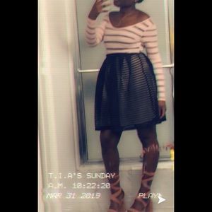 Pink heel with black puff skirt